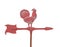 Old chicken weathervane isolated.