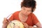 An old Chinese lady carefully looking at the globe in front of a white background