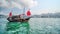 Old Chinese traditional fishing boat Junk that serves as a tourism at Victoria Habour in Hong Kong