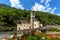 Old church and ancient bridge in Fontainemore, Italy