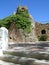 Old Church bell tower with Jesus Statue in Mijas village Spain