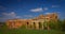 Old Church destroyed by the Bolsheviks in the years of persecution on the outskirts of the village. Landscape.