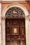 Old Church door with the Lamb of God in Corfu town on the the Greek island of Corfu