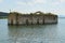 Old church engulfed in the water of dam lake