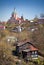 Old church on the hill and living houses in Smolen