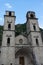 Old church inside Stari Grad, Kotor, Montenegro. Kotor bay and Old Town from Lovcen Mountain. Montenegro. Tower with mountains in