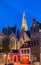 The old church Oude Kerk in Amsterdam city at night, Netherlands.