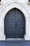 Old church textured door with stone arch