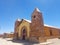 Old church in a village in South America, constructed with clay bricks and mud