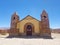 Old church in a village in South America, constructed with clay bricks and mud