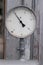 Old circular industrial pressure gauge