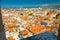 Old city buildings with orange roofs and Mosor Mountain aerial panoramic view from venetian Saint Domnius bell tower, Split,