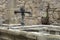 Old city fountain with iron faucet