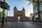 Old city gate Kamperbinnenpoort in Amersfoort city. Two towers are connected to an arch gate