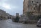 Old City of Jerusalem - Christian Quarter, empty street and square in the morning in rainy weather.  Israel