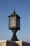 Old city lamp isolated on blue sky