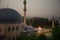 Old city of Sanliurfa, Turkey. Mevlidi Halil Cami mosque and minarets at dusk.