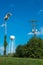 Old civil defense siren, old water tower and utility pole/old in