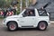 Old classic 4WD car Suzuki Vitara driving to a veteran car show