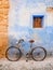 Old classic bicycle parked on a village street