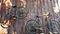 Old classic bicycles hanging on wooden wall.