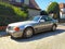 Old classic big luxury coupe car Mercedes Benz 300 SL left side parked