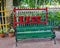 Old classic fire extinguishing water buckets & wooden bench with cast frame