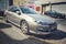 Old classic grey Renault Laguna second hatchback version right side view