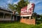 Old classic neon sign for the Arrowhead Motel, now abandoned