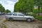 Old classic scrap rusty veteran hatchback car silver grey Ford Mondeo parked