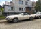 Old classic vintage ebony white Jaguar XJS 12V convertible parked