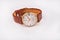 Old classic wristwatch for man with brown strap on white