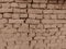 Old clay brickworks in Sepia colour. Wall clay bricks and cracks suitable for rustic retro style background.