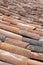 Old clay tile roof detail in vertical format