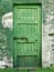 Old closed green door