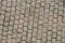 Old cobbles brick wall background texture pattern