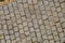 Old cobbles brick wall background texture pattern