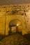 Old cobblestone path to Kalemegdan fortress at night covered in fog, Belgrade