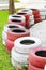 Old color strip tire wall at the curve of go cart circuit runway for safety racing speed cockpit