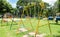 Old Colorful Empty Chain Swings on Kids Playground