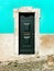 Old and colorful facade and wooden door in Lisbon