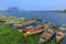 Old colorful fishermen boats on the banks of river Krishna at Vijayawada, India