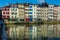 Old colorful houses of `Le Petit Bayonne` district along the river Nive, Bayonne, France