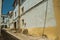 Old colorful houses with whitewashed wall