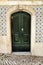 Old and colorful wooden door with iron details