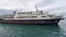 Old Commercial Shipping Boat Docked in Seaport