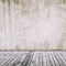 Old concrete wall with old wooden floor, abstract vintage background.