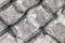 Old concrete wall with rhombic pattern to background.This makes a great grungy background texture.