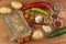 Old cookbook recipes on a wooden table. Cook healthy vegetable. Preparation of home diet food.