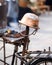 old copper cauldron and an antique bicycle saddle